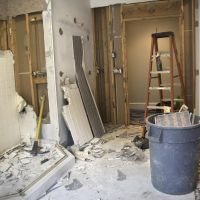 Master Bathroom Remodeling: Demolition Phase. The Master Bathroom is being demolished to the stud walls / subfloor level. Tiles are being taken down and wallpapers are being removed.